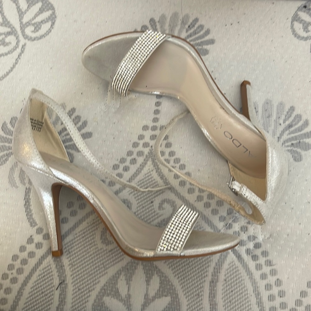 Silver heel. Rhinestone. Also heel.